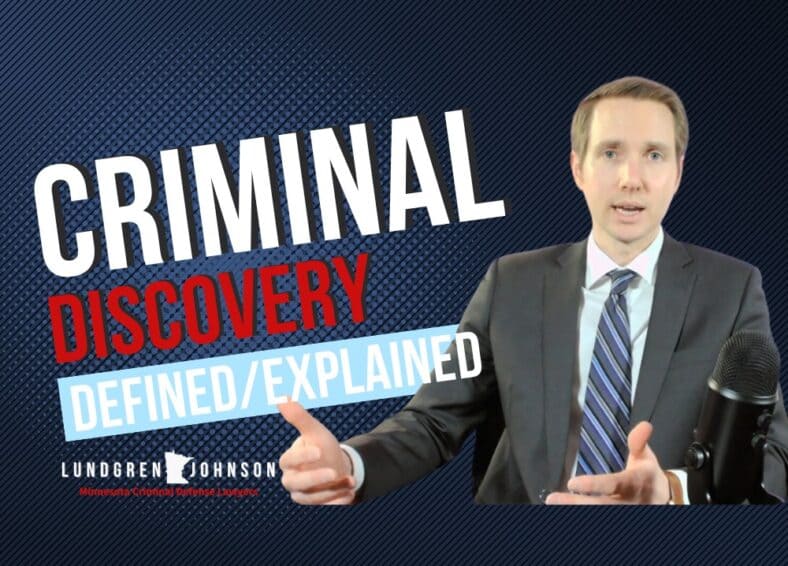 Criminal defense lawyer sitting next to text that says discovery defined/explained