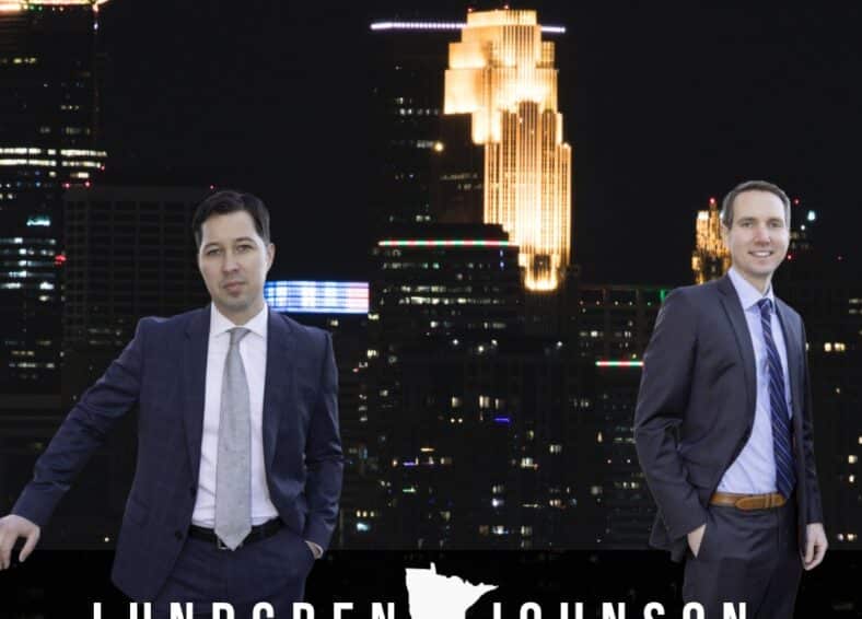 Drug Lawyers standing in front of the Minneapolis Skyline